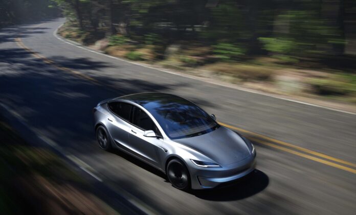 tesla-model-3-logo-scaled-e1720080328971.jpeg